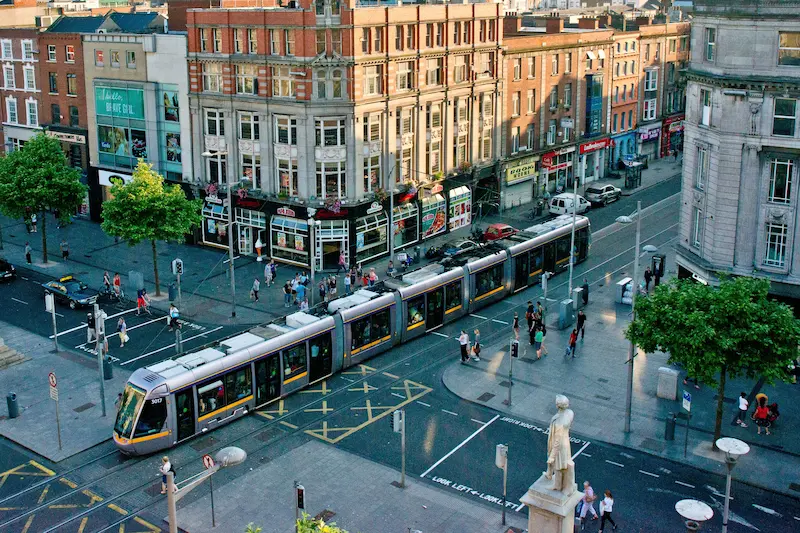 A luas tram travelling through Dublin city on the light rail network